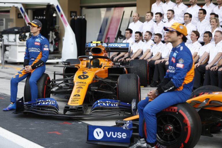Lando Norris, McLaren and Carlos Sainz, McLaren pose for team photo