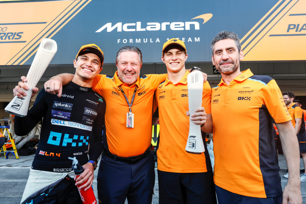 Lando Norris, Zak Brown, Oscar Piastri. Andrea Stella, McLaren